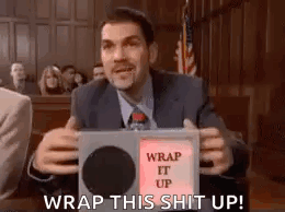 A Man Is Sitting In A Courtroom Holding A Box That Says `` Wrap This Shit Up '' . GIF