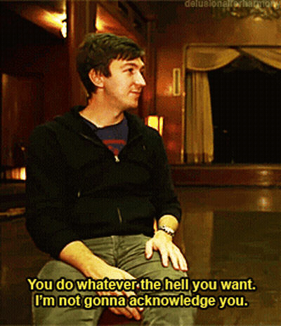 A Man Is Sitting In A Dark Room And Says " You Do Whatever The Hell You Want " GIF