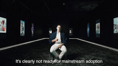 A Man Is Sitting In A Dark Room With The Words It 'S Clearly Not Ready For Mainstream Adoption GIF
