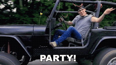 A Man Is Sitting In A Jeep With The Words Party Written On The Side GIF