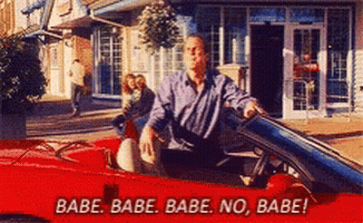 A Man Is Sitting In A Red Sports Car With The Words Babe Babe Babe No Babe GIF