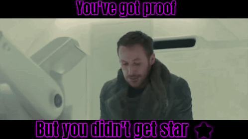 A Man Is Sitting In A Room With The Words " You 'Ve Got Proof But You Did N't Get Star " GIF