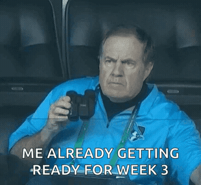 A Man Is Sitting In A Stadium Holding A Camera And Says `` Me Already Getting Ready For Week 3 '' GIF