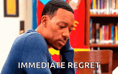 A Man Is Sitting In Front Of A Bookshelf With The Words Immediate Regret Written On The Bottom GIF