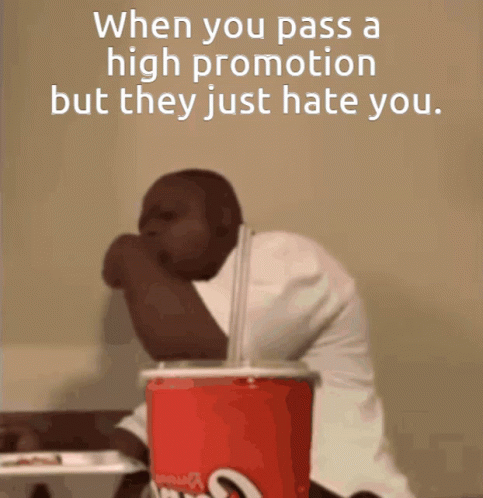 A Man Is Sitting In Front Of A Coca Cola Cup With A Straw GIF