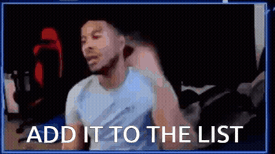 A Man Is Sitting In Front Of A Computer With The Words `` Add It To The List '' Written On The Screen . GIF