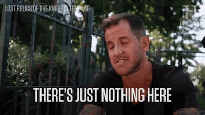 A Man Is Sitting In Front Of A Fence With His Eyes Closed And The Words `` There 'S Just Nothing Here '' . GIF
