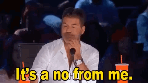 A Man Is Sitting In Front Of A Microphone With His Eyes Closed And Saying `` It 'S A No From Me '' . GIF