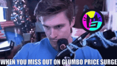 A Man Is Sitting In Front Of A Microphone With The Words When You Miss Out On Gumbo Price Surge Written Above Him GIF