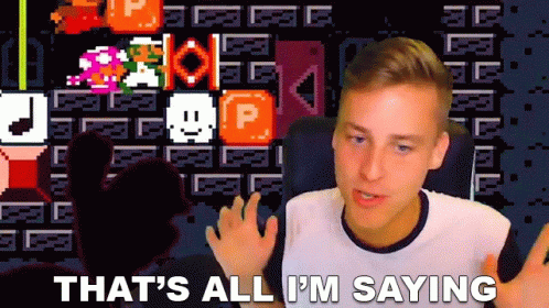 A Man Is Sitting In Front Of A Screen That Says That 'S All I 'M Saying . GIF