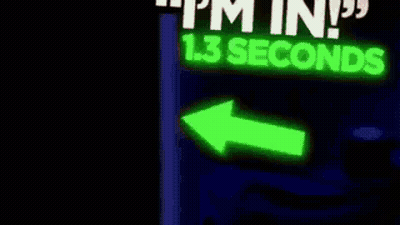 A Man Is Sitting In Front Of A Sign That Says `` I 'M In ! '' GIF