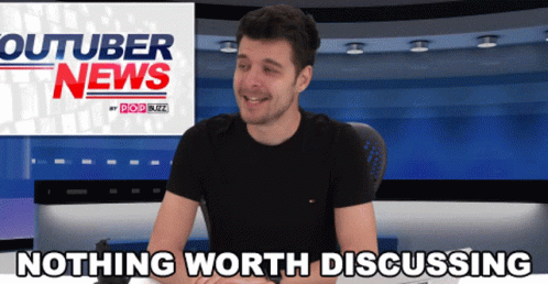 A Man Is Sitting In Front Of A Youtuber News Sign GIF