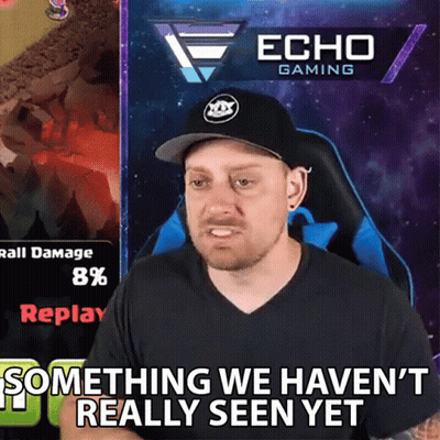 A Man Is Sitting In Front Of An Echo Gaming Banner GIF