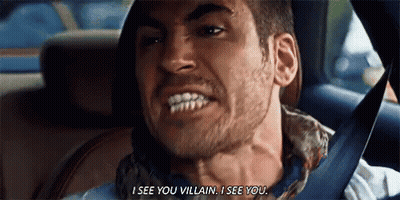 A Man Is Sitting In The Back Seat Of A Car And Saying `` I See You Villain I See You '' . GIF