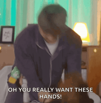 A Man Is Sitting On A Bed And Says Oh You Really Want These Hands . GIF