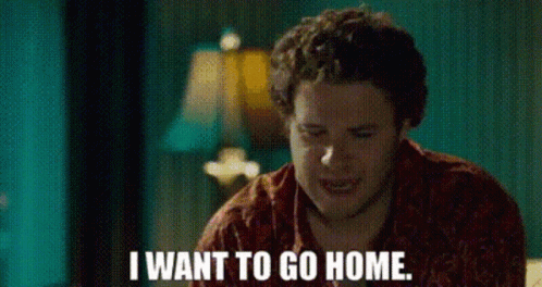 A Man Is Sitting On A Couch And Saying `` I Want To Go Home . '' GIF