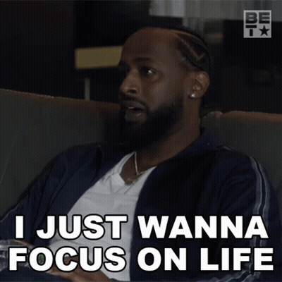 A Man Is Sitting On A Couch And Says I Just Wanna Focus On Life GIF