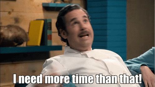 A Man Is Sitting On A Couch And Says I Need More Time Than That GIF