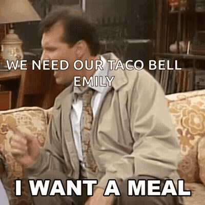 A Man Is Sitting On A Couch And Says " We Need Our Taco Bell Emily " GIF