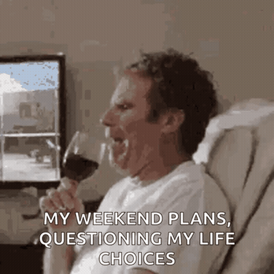 A Man Is Sitting On A Couch Drinking A Glass Of Wine And Saying My Weekend Plans Questioning My Life Choices . GIF
