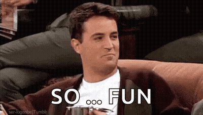 A Man Is Sitting On A Couch Holding A Cup And Saying `` So Fun '' While Holding A Cup Of Coffee . GIF