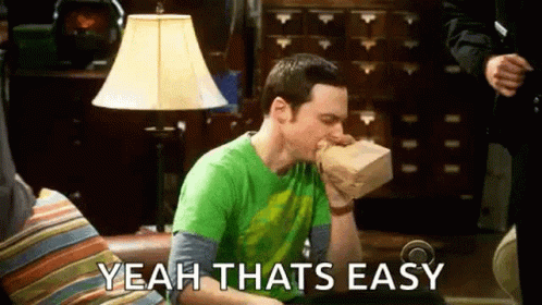 A Man Is Sitting On A Couch With A Bag In His Mouth And The Words `` Yeah That 'S Easy '' . GIF