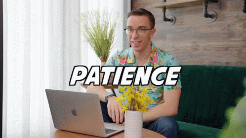 A Man Is Sitting On A Couch With A Laptop And The Word Patience Is On The Screen GIF