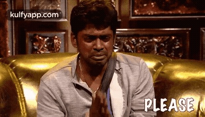 A Man Is Sitting On A Couch With His Hands Folded In Prayer And The Word Please Written On The Bottom . GIF