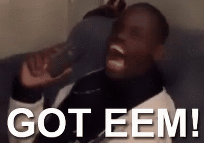 A Man Is Sitting On A Couch With His Mouth Open And The Words Got Eem On The Bottom GIF