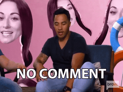 A Man Is Sitting On A Couch With The Word No Comment Written On The Bottom GIF