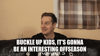 A Man Is Sitting On A Couch With The Words " Buckle Up Kids , It 'S Gonna Be An Interesting Offseason " GIF