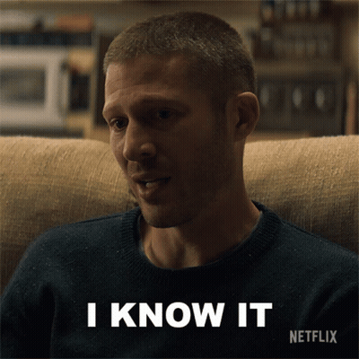 A Man Is Sitting On A Couch With The Words I Know It Written Below Him GIF