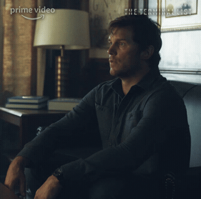 A Man Is Sitting On A Couch With The Words Yes Sir Written On His Face GIF