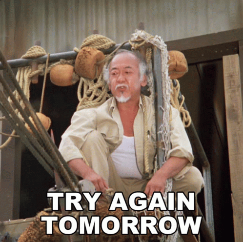 A Man Is Sitting On A Ladder With The Words Try Again Tomorrow Written Below Him GIF