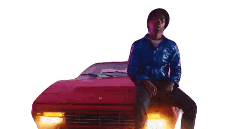A Man Is Sitting On The Hood Of A Red Car With His Legs Crossed . Sticker