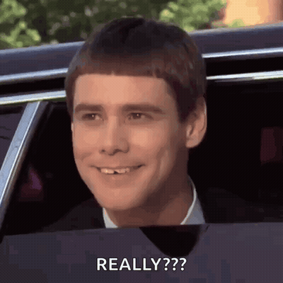 A Man Is Smiling And Looking Out Of A Car Window With The Words `` Really '' Written On The Bottom . GIF