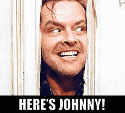 A Man Is Smiling And Looking Through A Window With The Words Here 'S Johnny Below Him GIF