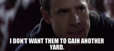 A Man Is Smiling And Saying I Don T Want Them To Gain Another Yard . GIF