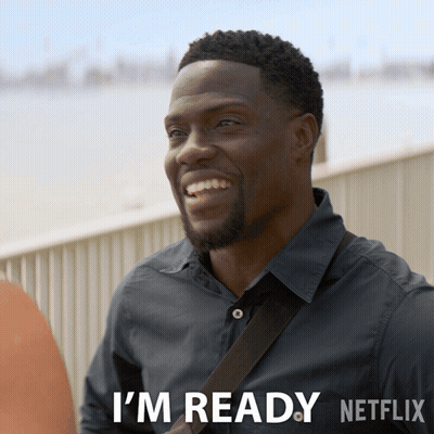 A Man Is Smiling And Says I 'M Ready Netflix On The Bottom GIF