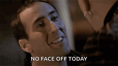 A Man Is Smiling And Talking To A Woman While Wearing A Mask And Says `` No Face Off Today '' . GIF