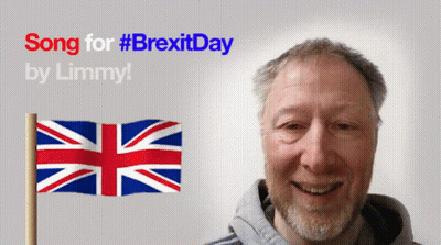 A Man Is Smiling In Front Of A Sign That Says Song For #Brexitday GIF