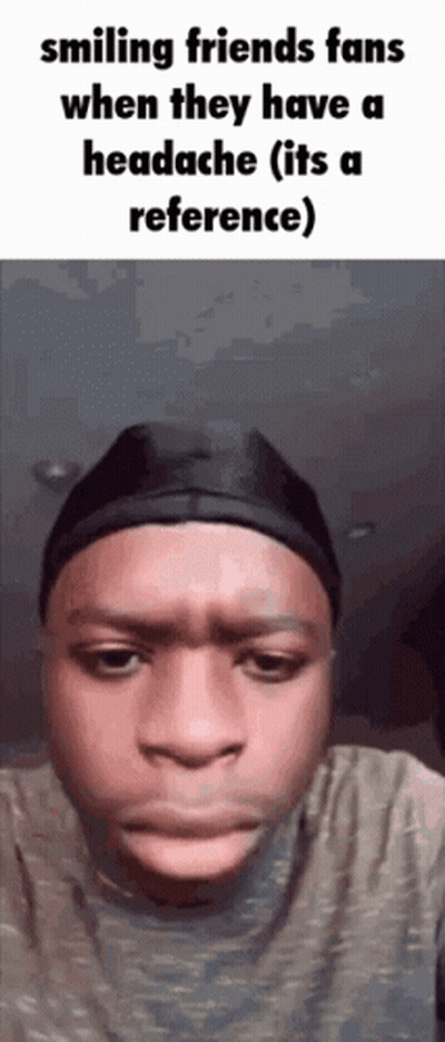 A Man Is Smiling When They Have A Headache And It 'S A Reference . GIF
