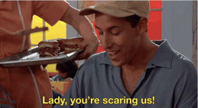 A Man Is Smiling While A Woman Holds A Tray Of Food And Says Lady You 'Re Scaring Us .. GIF