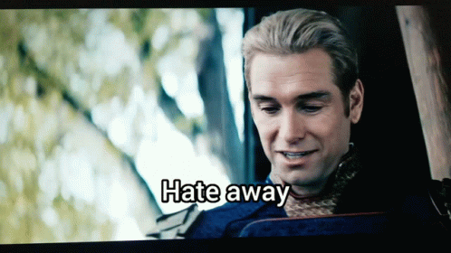 A Man Is Smiling With The Words Hate Away Written Above Him GIF