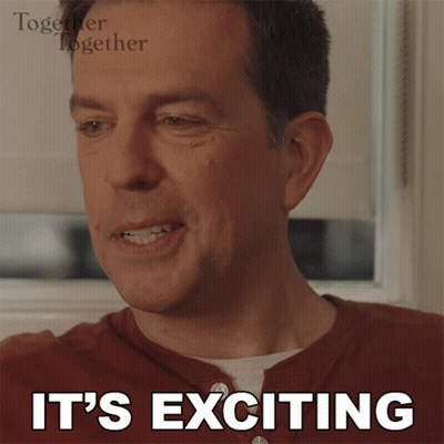 A Man Is Smiling With The Words It 'S Exciting Below Him GIF