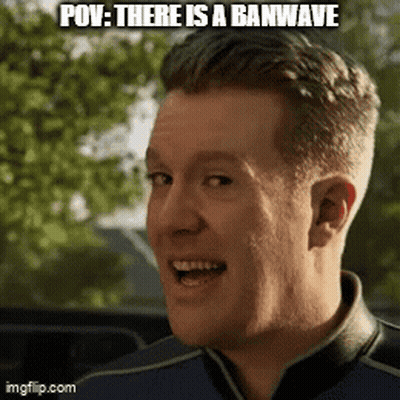 A Man Is Smiling With The Words Pov : There Is A Banwave On His Face GIF