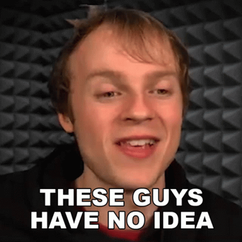 A Man Is Smiling With The Words These Guys Have No Idea Below Him GIF