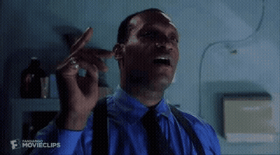 A Man Is Smoking A Cigarette And Saying `` I See You Soon !!! '' . GIF