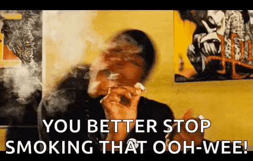 A Man Is Smoking A Cigarette And The Words `` You Better Stop Smoking That Ooh-Wee '' Are Visible . GIF