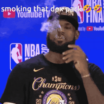 A Man Is Smoking A Cigarette In Front Of A Youtube Logo GIF